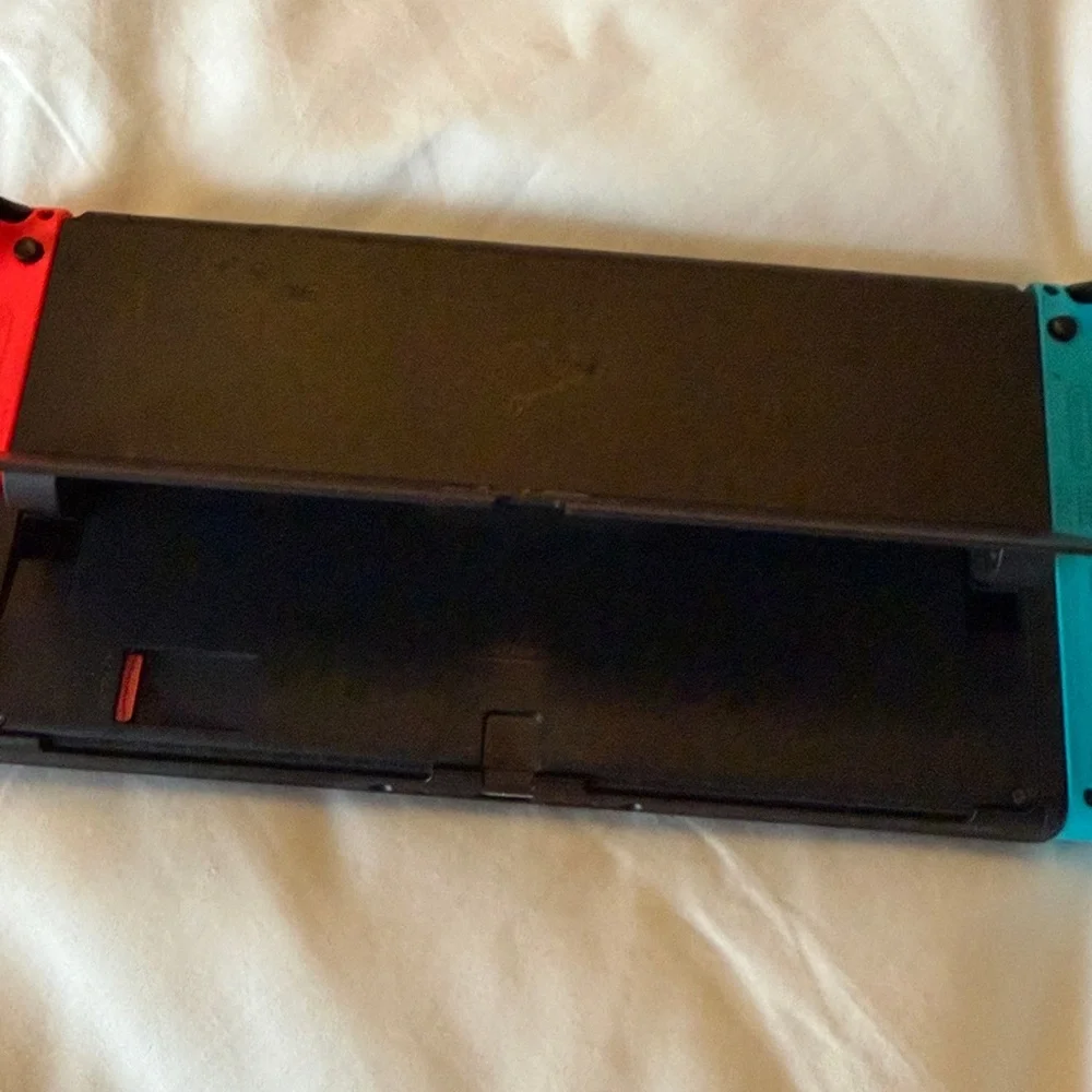 Nintendo oled included with HDMI wire and usb charger